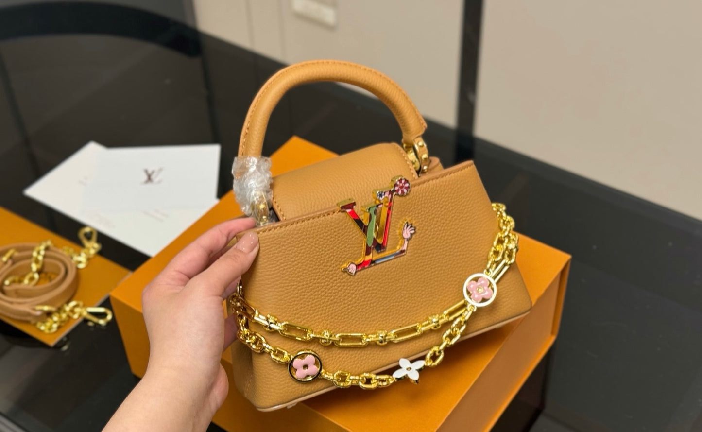 LV Capucines Mini – Charm Chain Edition