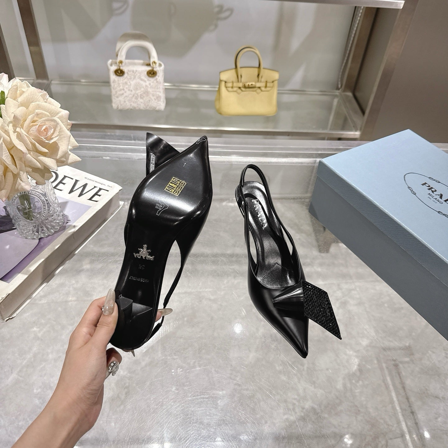 Prada Opulent Chain-Embellished Leather Loafers