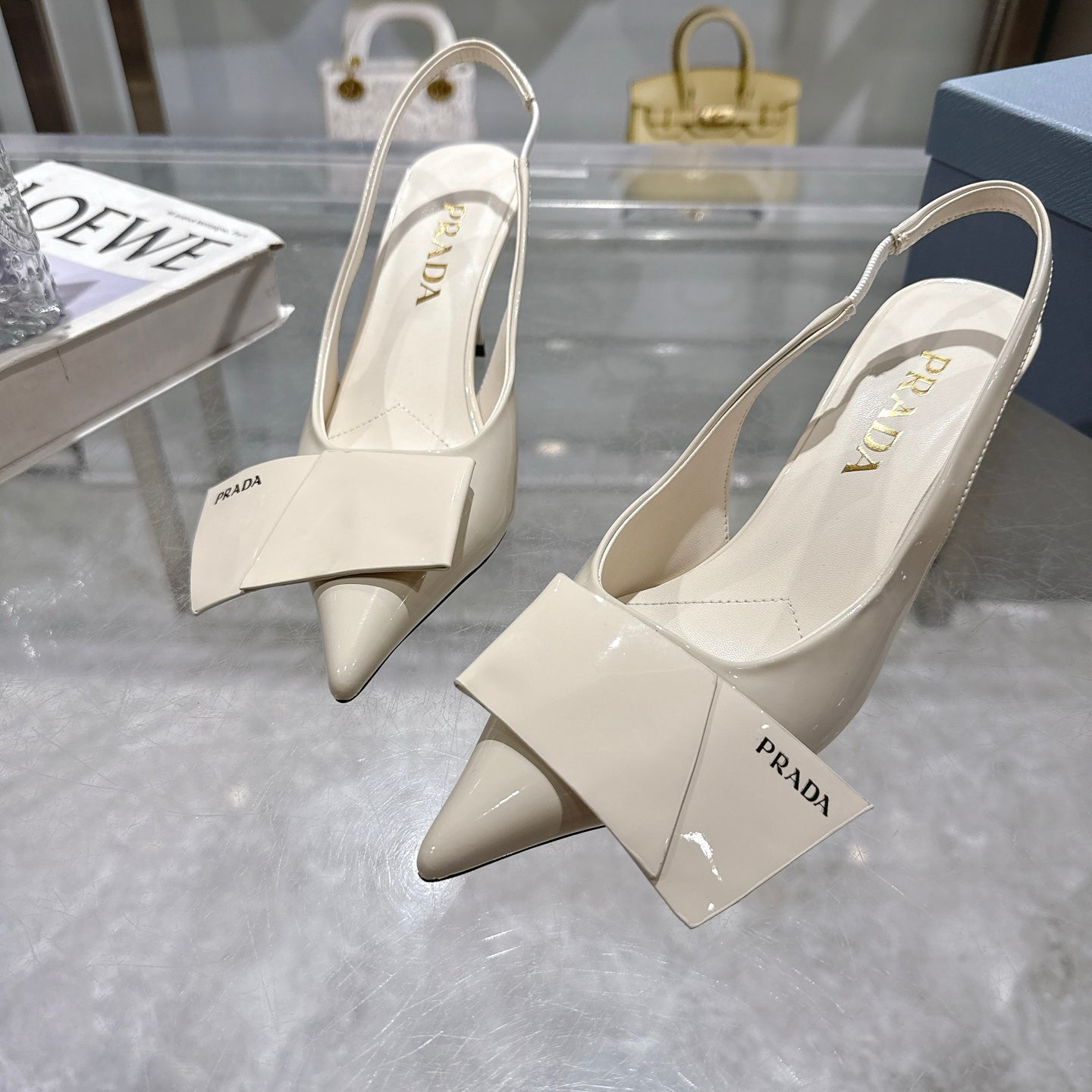 Prada Opulent Chain-Embellished Leather Loafers