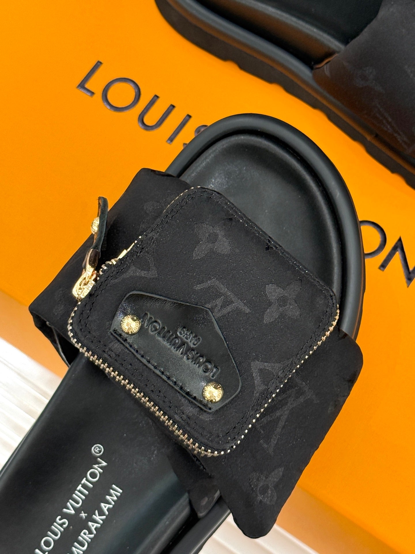 Louis Vuitton x Takashi Murakami-inspired slide sandals