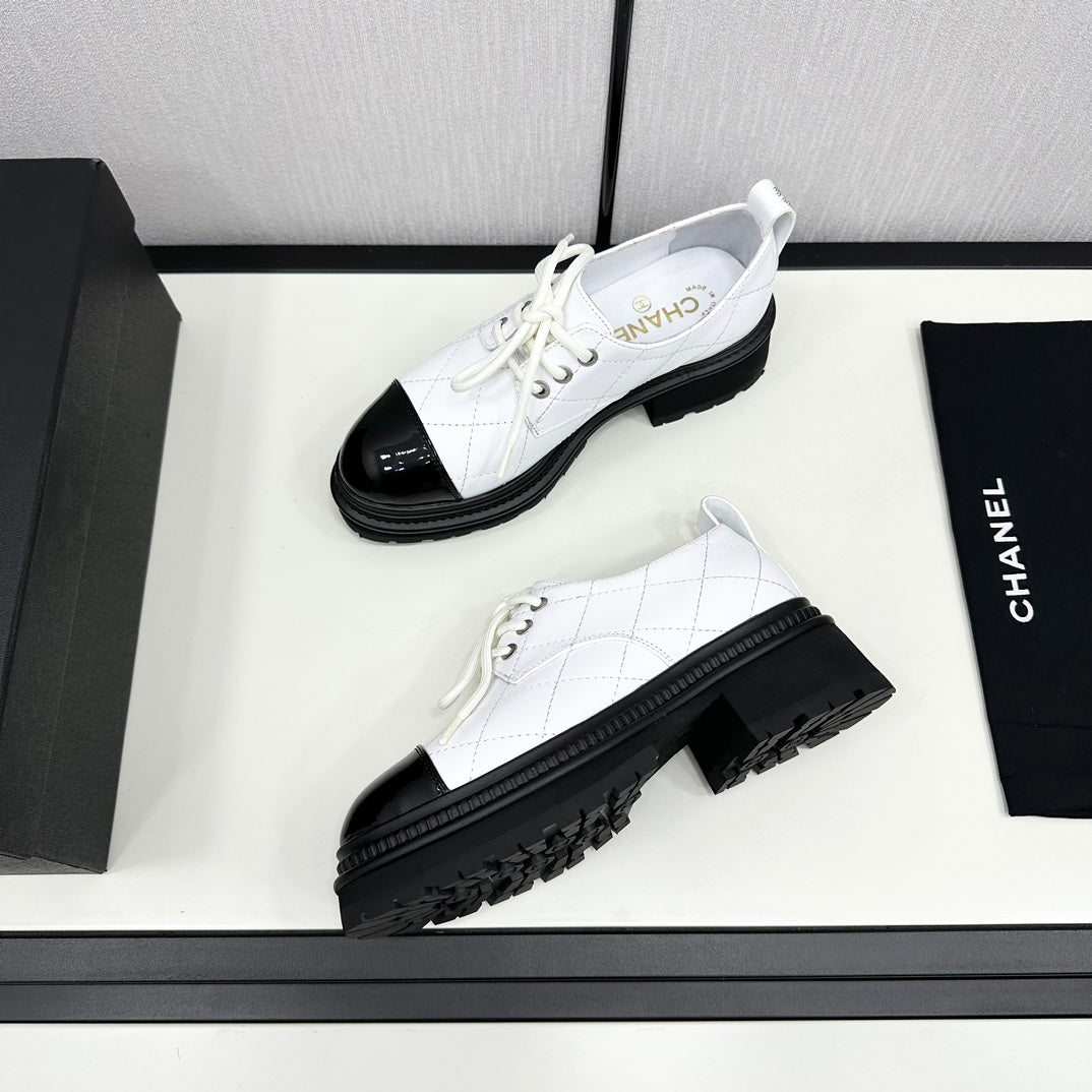 Chanel Elegant Turnlock Leather Loafers