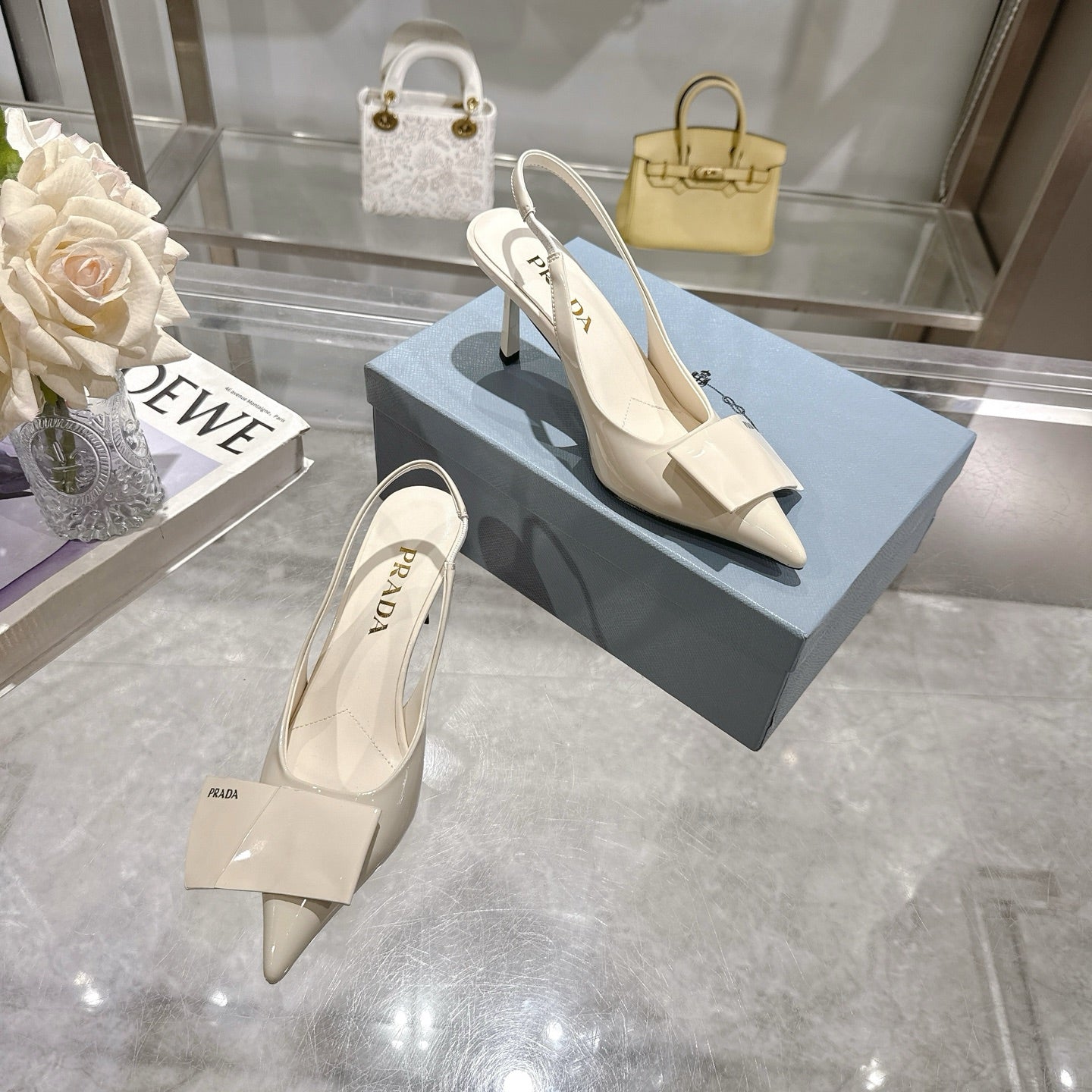 Prada Opulent Chain-Embellished Leather Loafers