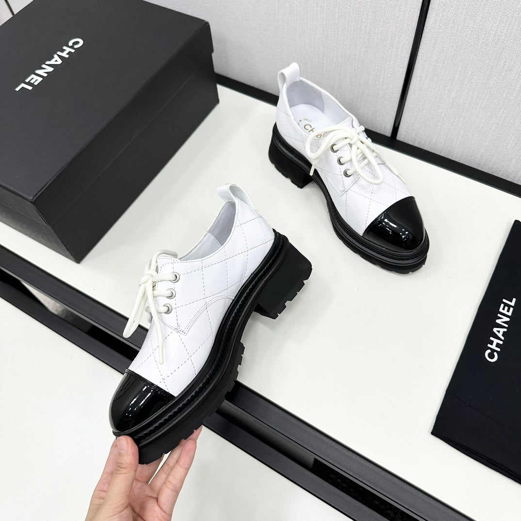 Chanel Elegant Turnlock Leather Loafers