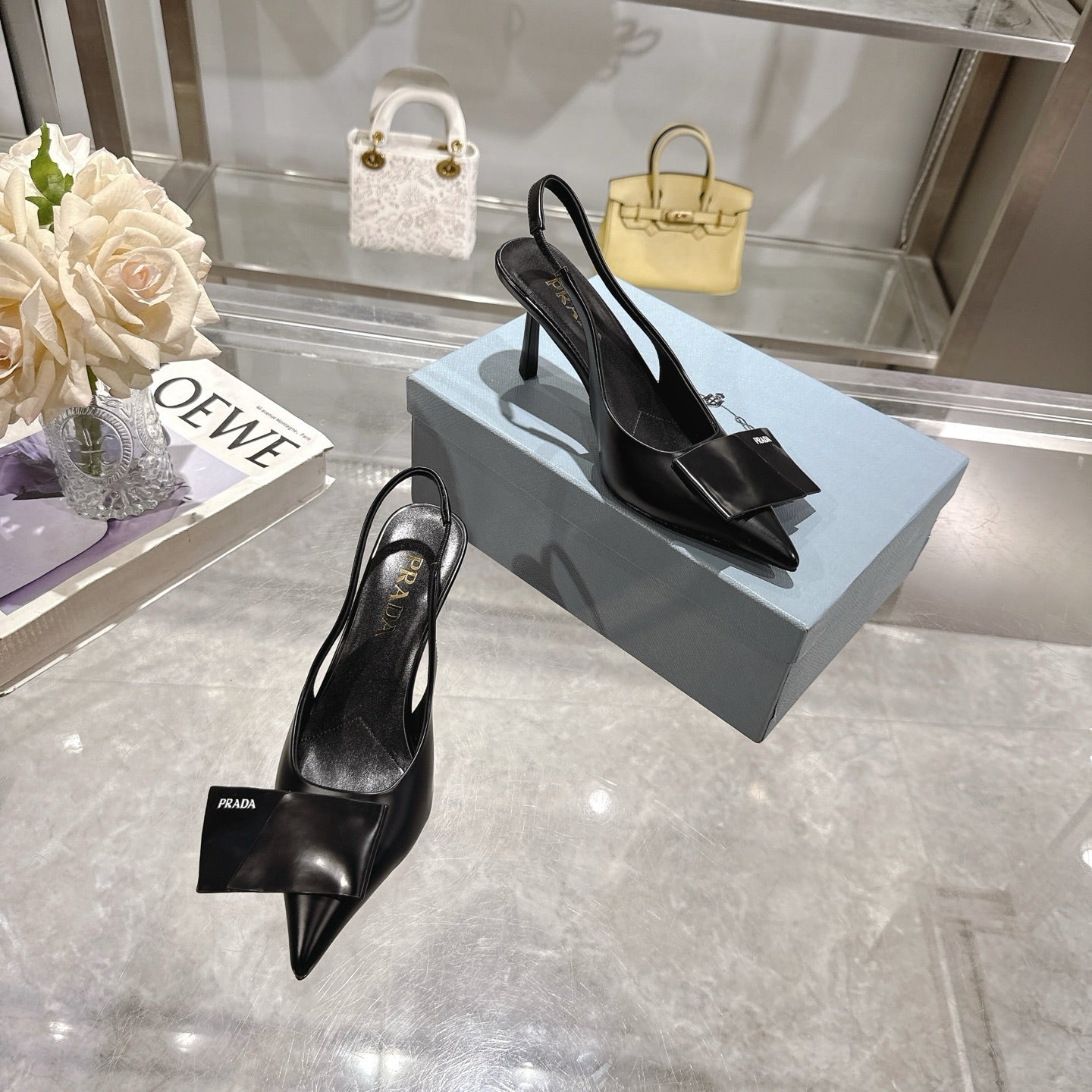 Prada Opulent Chain-Embellished Leather Loafers