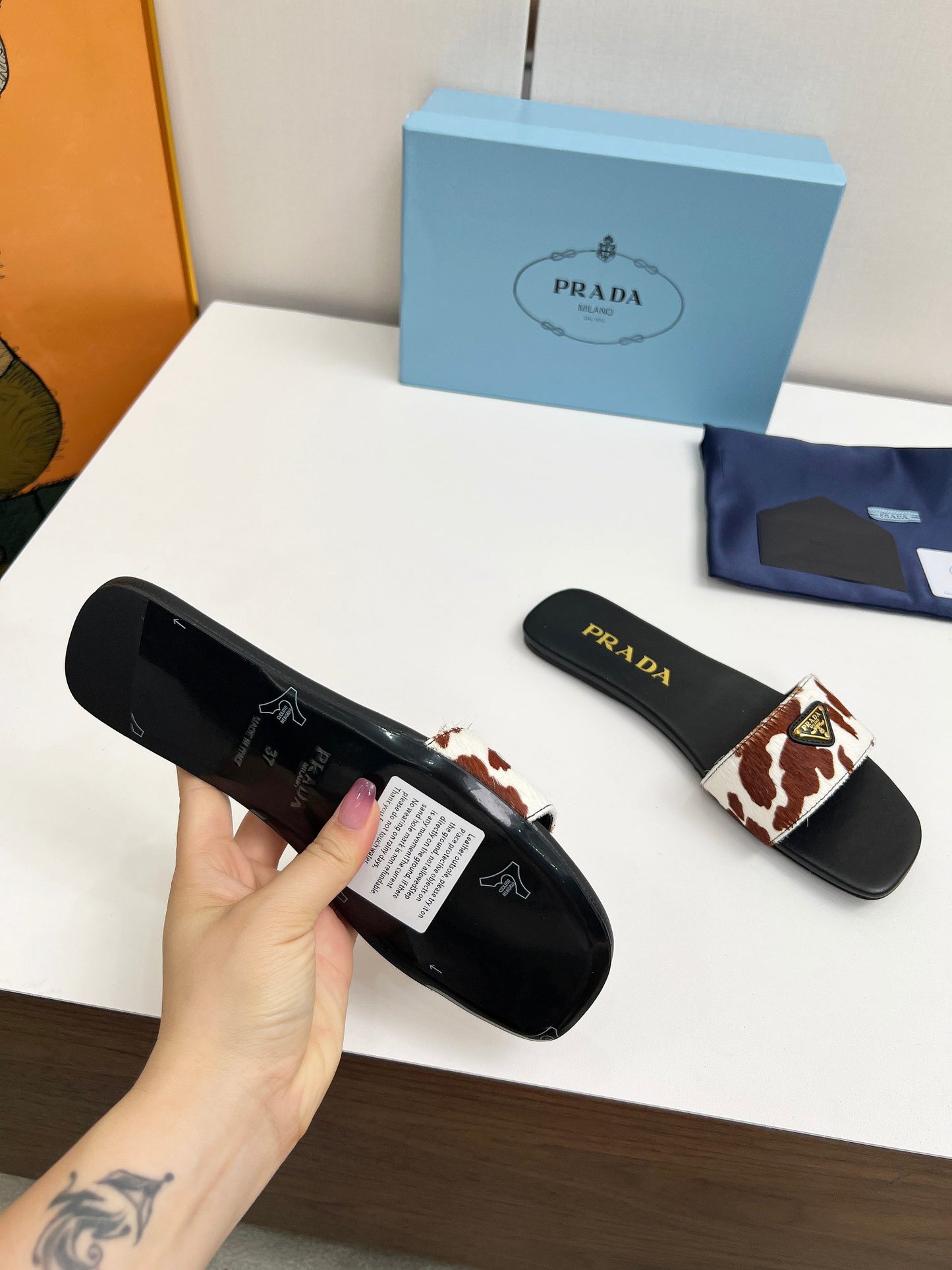 Prada Enameled Elegance Slides